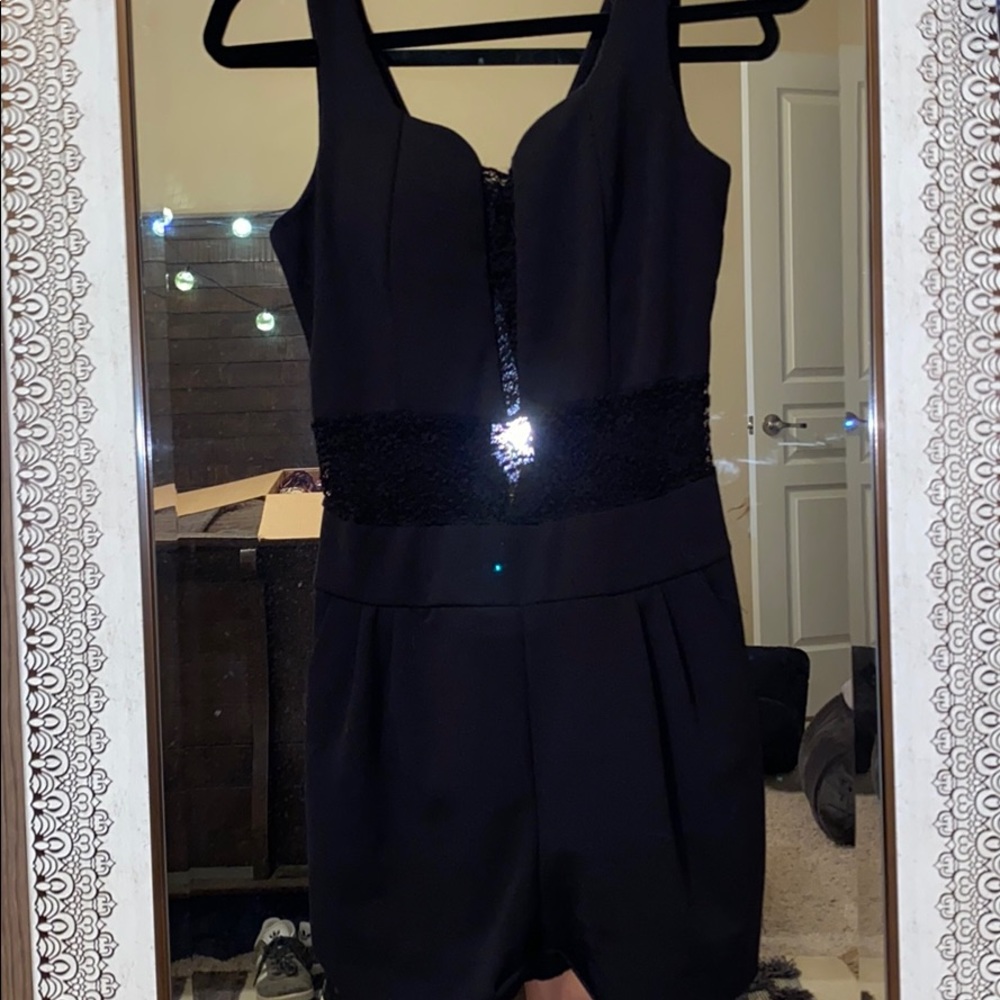 Black romper with lace